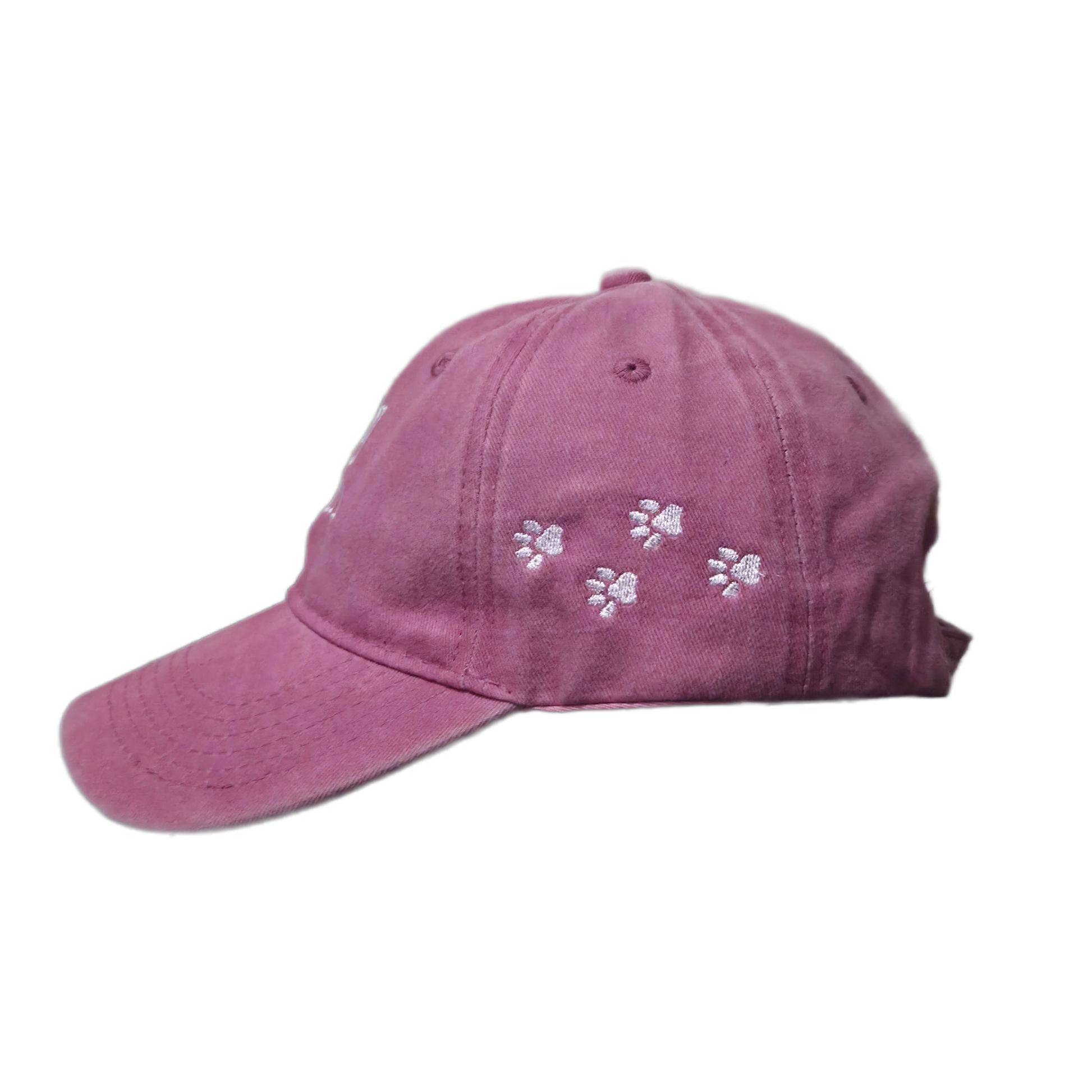 Left side view of pink Dog Mom embroidered baseball cap showing four paw prints on the side