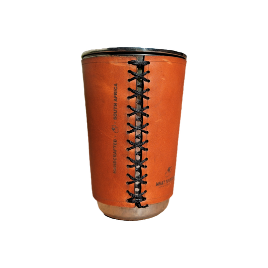 Back of leather sleeve on stainless steel glass showing black thread stitched in a criss-cross pattern