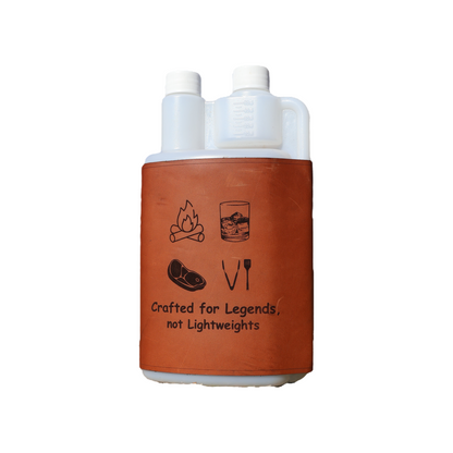 1L plastic squeezy bottle with brown leather sleeve featuring camping or braai-themed illustrations, on white background